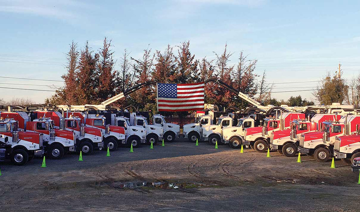 https://dev.epicslc1.com/discovery/wp-content/uploads/2021/02/trucks-american-flag.jpg